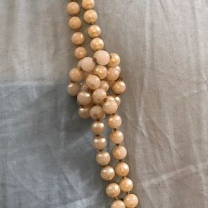 Playful knotted pearl costume jewelry